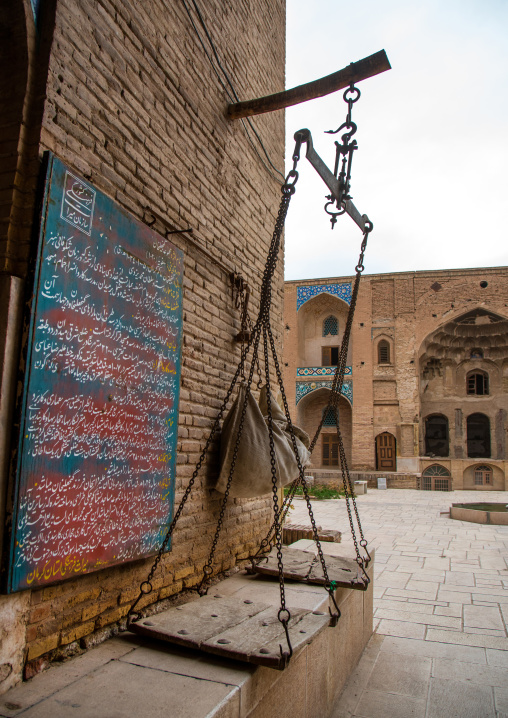 balance at the entrance of the caravanserai of ganj ali khan, Central County, Kerman, Iran