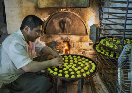 Man Preparing Some Berenji Cakes, Kermanshah, Iran