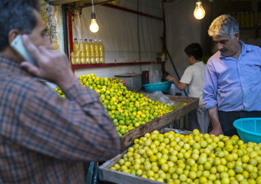 Man Selling Lemons, In The Bazaar, Kermanshah, Iran