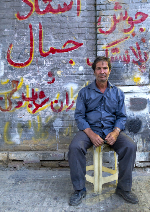 Man Sitting In The Street, Kermanshah, Iran