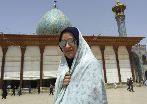Woman with sunglasses in the shah-e-cheragh mausoleum, Fars province, Shiraz, Iran