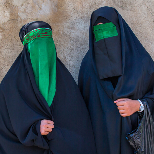 Iranian Shiite Muslim Women Mourning Imam Hussein On The Day Of Tasua With Their Faces Covered By A Green Veil, Lorestan Province, Khorramabad, Iran