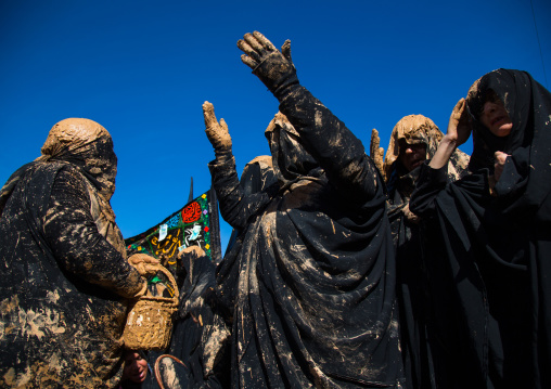 Iranian Shiite Muslim Women Covered In Mud, Chanting And Self-flagellating During Ashura, The Day Of The Death Of Imam Hussein, Kurdistan Province, Bijar, Iran