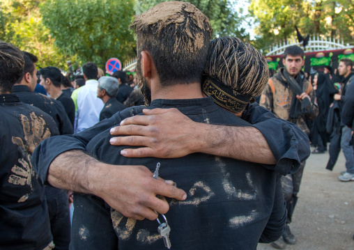 Iranian Shiite Muslim Men Covered In Mud Crying During Ashura Day, Kurdistan Province, Bijar, Iran