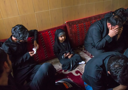 Little Girl In The Middle Of Shiite Muslim Mourners From The Mad Of Hussein Community Crying While Celebrating Muharram, Isfahan Province, Kashan, Iran