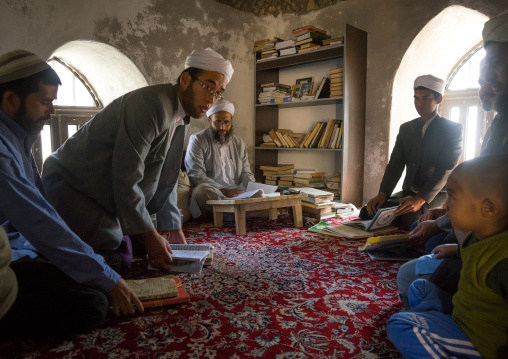 An Imam Teaching The Koran To Shiite Muslim Students In A Coranic School, Golestan Province, Karim Ishan, Iran