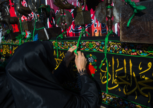 Iranian Shiite Women Putting Green Ribbons On An Alam To Make Wishes During Chehel Menbari Festival On Tasua Day, Lorestan Province, Khorramabad, Iran