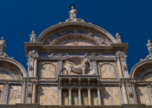 Detail of an old building with lion statue, Veneto Region, Venice, Italy