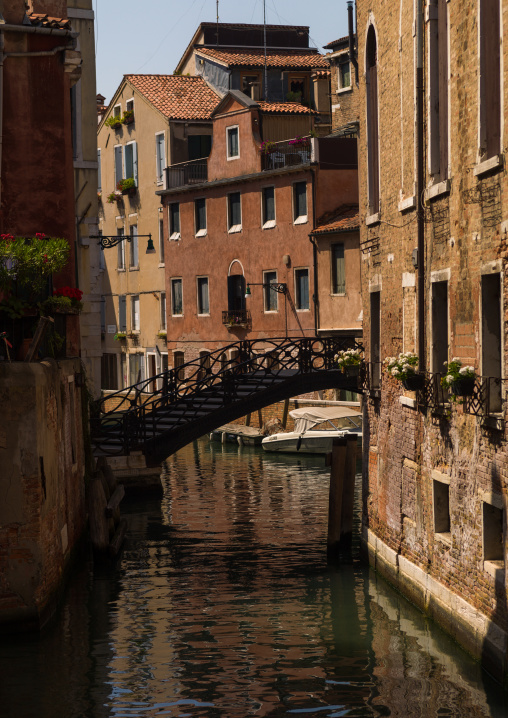 Bridge over a small canal in the old town, Veneto Region, Venice, Italy