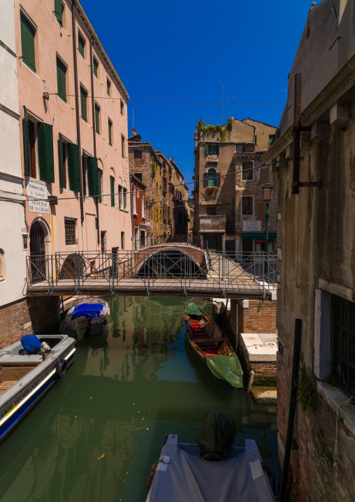Bridge over a small canal in the old town, Veneto Region, Venice, Italy