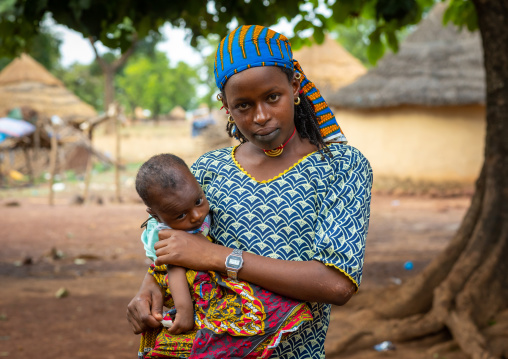 Portrait of a Peul tribe mother with her child, Savanes district, Boundiali, Ivory Coast