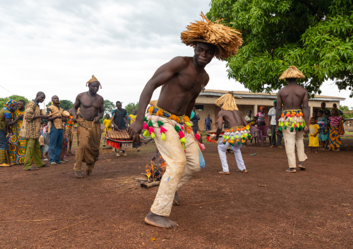 Senufo shirtless man dancing the Ngoro during a ceremony, Savanes district, Ndara, Ivory Coast