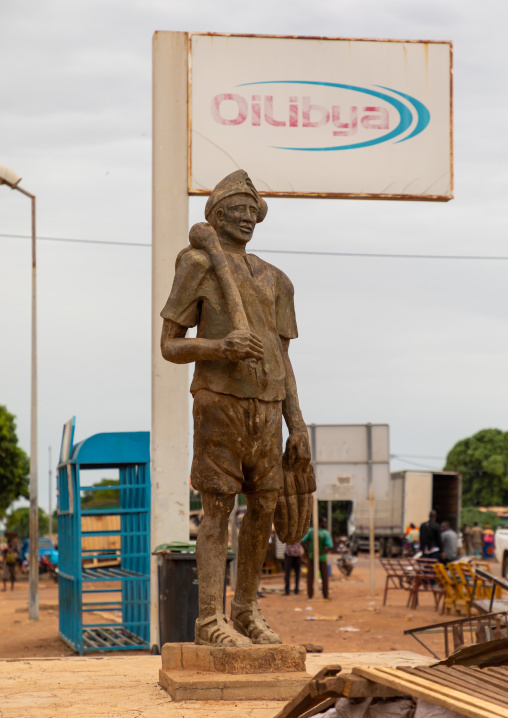Statue in town at the entrance of a gas station, Savanes district, Kouto, Ivory Coast