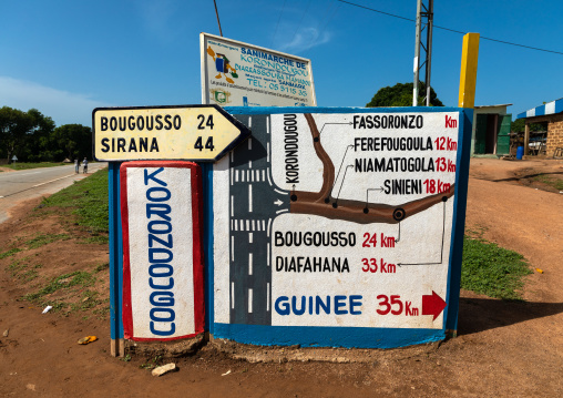 Arrows and signposts on the road, Denguélé, Korondougou, Ivory Coast