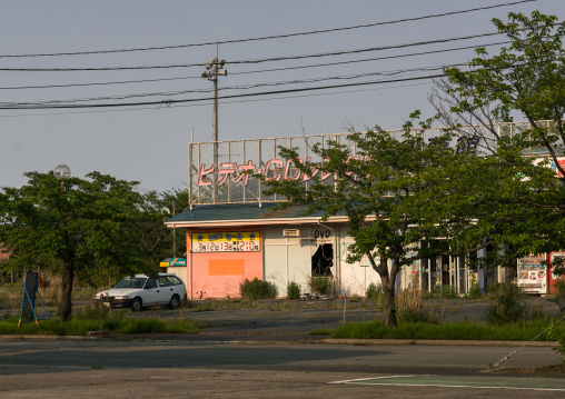 Abandoned shop in the difficult-to-return zone after the daiichi nuclear power plant irradiation, Fukushima prefecture, Tomioka, Japan
