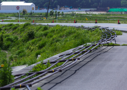 A collapsed fence road by the 2011 earthquake and tsunami, Fukushima prefecture, Futaba, Japan