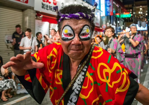 Japanese dancer with makeup during the Koenji Awaodori dance summer street festival, Kanto region, Tokyo, Japan
