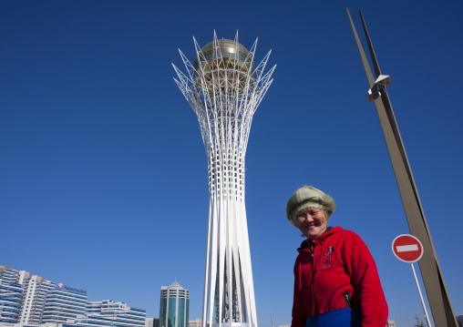 Old Woman In Front Of Baiterek Tower, Astana, Kazakhstan