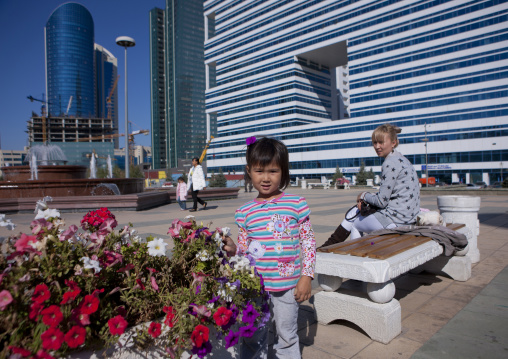 Little Girl And Flowers, Astana, Kazakhstan