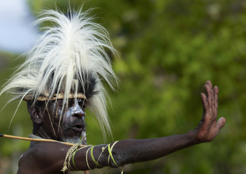 Portrait of a Tharaka tribe man with a colobus headdress, Laikipia County, Mount Kenya, Kenya