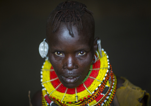 Turkana tribe woman with huge necklaces and earrings, Turkana lake, Loiyangalani, Kenya