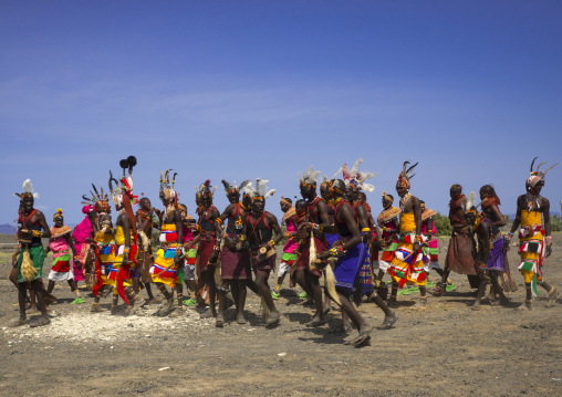 Rendille and turkana tribes dancing together during a festival, Turkana lake, Loiyangalani, Kenya