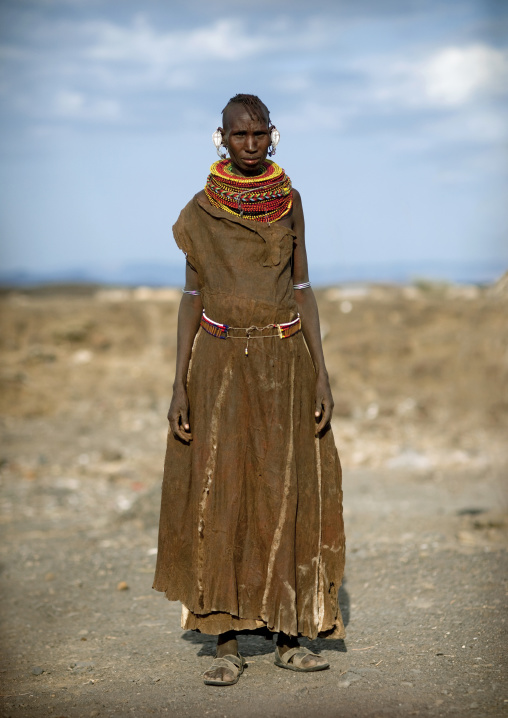 Portrait of a Turkana tribe woman with large earrings and necklaces, Rift Valley Province, Turkana lake, Kenya
