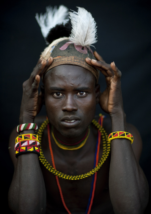 Portrait of a Turkana tribe man with a headwear, Rift Valley Province, Turkana lake, Kenya