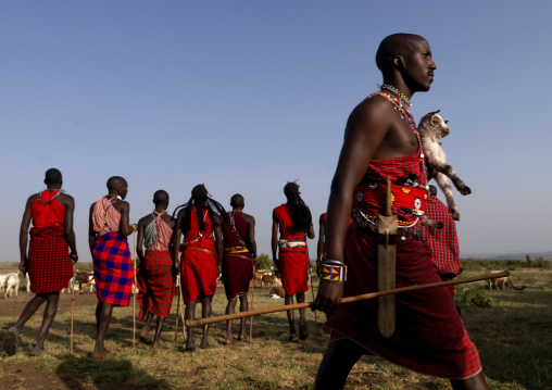 Maasais tribe men in traditional clothing, Kajiado County, Amboseli park, Kenya