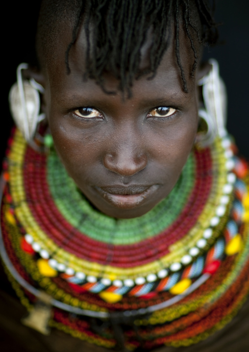Portrait of a Turkana tribe woman with huge necklaces, Rift Valley Province, Turkana lake, Kenya
