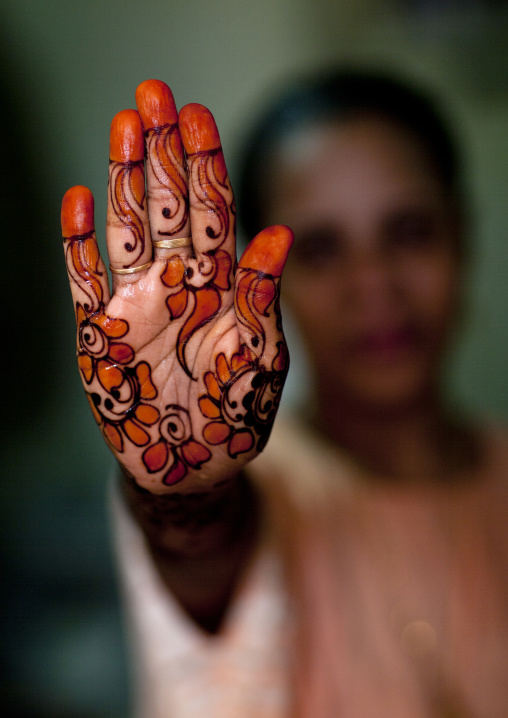 Unrecognizable person shows hand palm painted with henna, Lamu County, Lamu, Kenya