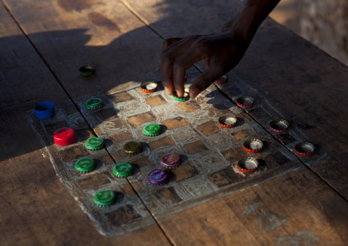 A chessboard made with bottle caps pawns, Lamu County, Lamu, Kenya