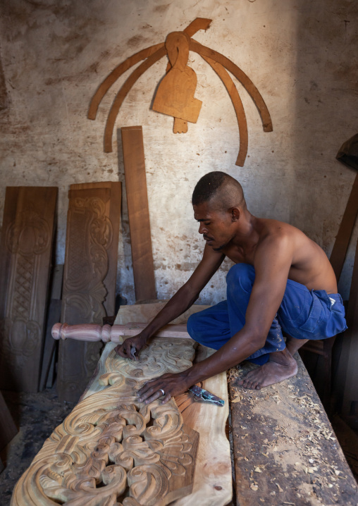 Wood carver in his workshop, Lamu County, Lamu, Kenya