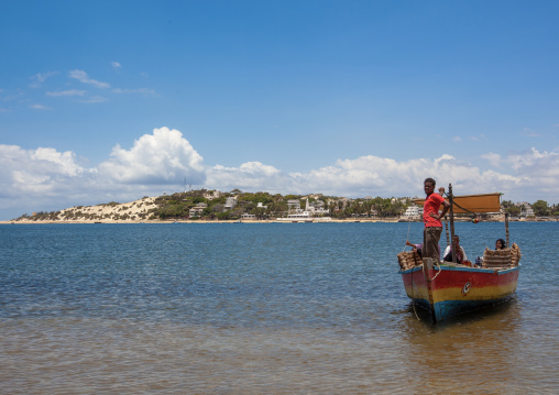 Taxo boat arriving on the beach, Lamu County, Manda island, Kenya