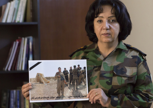Colonel Nahida Ahmad Rashid With A Picture Of Captain Rangin Yousuf Killed By Daesh, Sulaymaniyah, Kurdistan, Iraq