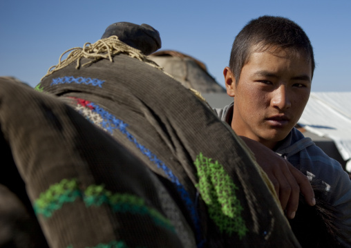 Young Man In The Village Of Jaman Echki Jailoo,  Song Kol Lake Area, Kyrgyzstan