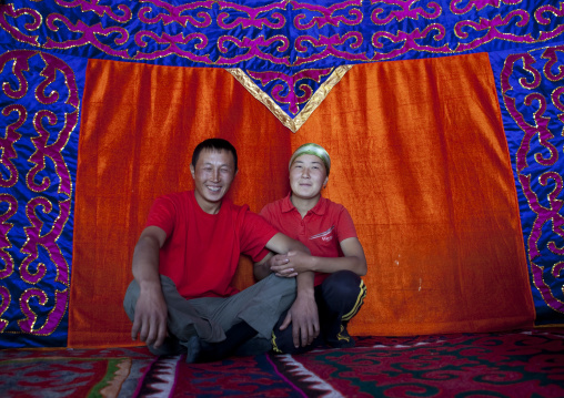 Couple Crouching Inside Their Yurt, Jaman Echki Jailoo Village, Song Kol Lake, Kyrgyzstan