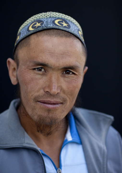 Man With Traditional Headgear At The Animal Market Of Kochkor, Kyrgyzstan