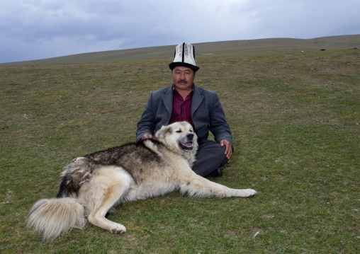 Man With Kalpak Hat With His Dog, Saralasaz Jailoo, Kyrgyzstan