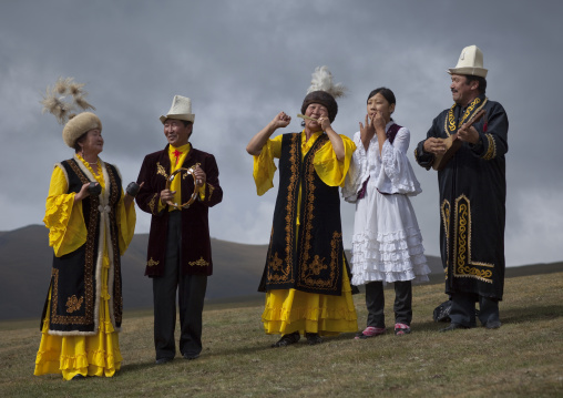 Men And Women Wearing Traditional Clothes And Hats, Saralasaz Jailoo, Kyrgyzstan
