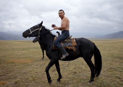 Bare Chest Horseman Ready For Horse Wrestling, Saralasaz Jailoo, Kyrgyzstan