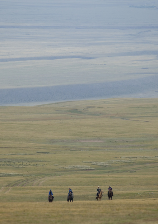 Boys Riding Horses In The Steppe, Saralasaz Jailoo, Kyrgyzstan