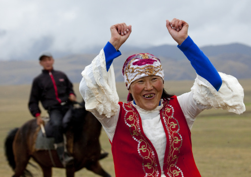 Man And Woman Playing Kyz Kuumai Horse Game, Saralasaz Jailoo, Kyrgyzstan