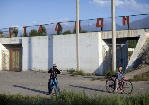 Boys With Bicycles In Kochkor, Kyrgyzstan
