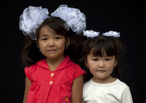 Young Girls Dressed For Their First Day Of School, Bishkek, Kyrgyzstan