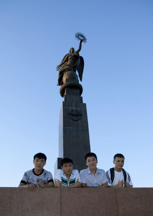 Teenagers Under The Erkindik Statue On Ala Too Square, Bishkek, Kyrgyzstan