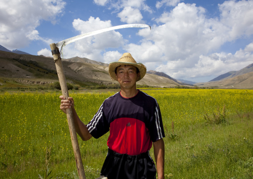 Man With A Scythe In The Fields, Road To Jaman Echki Jailoo, Kyrgyzstan
