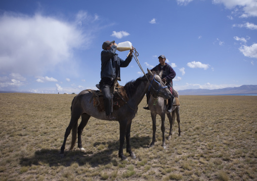 Men Drinking After A Horse Game, Song Kol Lake Area, Kyrgyzstan