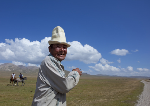 Old Man With Kalpak Hat Enjoying The Horse Game, Song Kol Lake Area, Kyrgyzstan