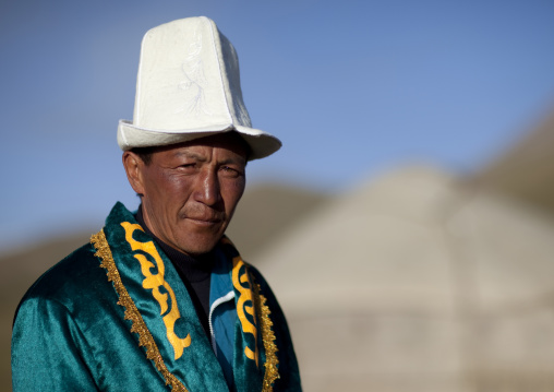 Man Wearing Traditional Clothes And Kalpak Hat, Jaman Echki Jailoo Village, Song Kol Lake Area, Kyrgyzstan